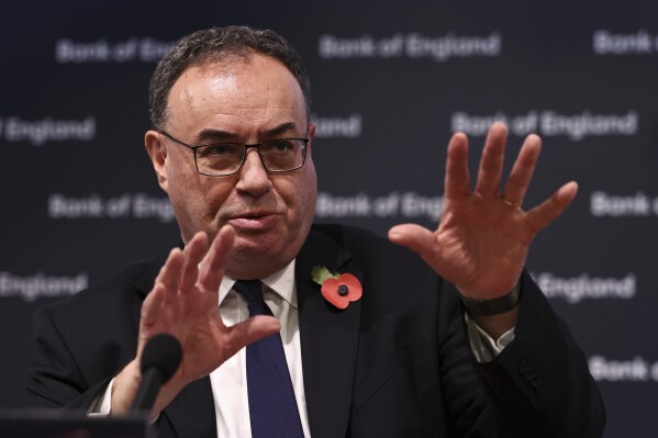 Governor of the Bank of England Andrew Bailey addresses the media during a press conference concerning interest rates, at the Bank of England, in London, Thursday, Nov. 2, 2023. The Bank of England kept its main interest rate unchanged on Thursday at the 15-year high of 5.25% and indicated that borrowing costs will likely remain at these sort of elevated levels for a while, especially if oil and gas prices increase sharply in light of the conflict between Israel and Hamas. (Henry Nicholls/Pool Photo via AP)