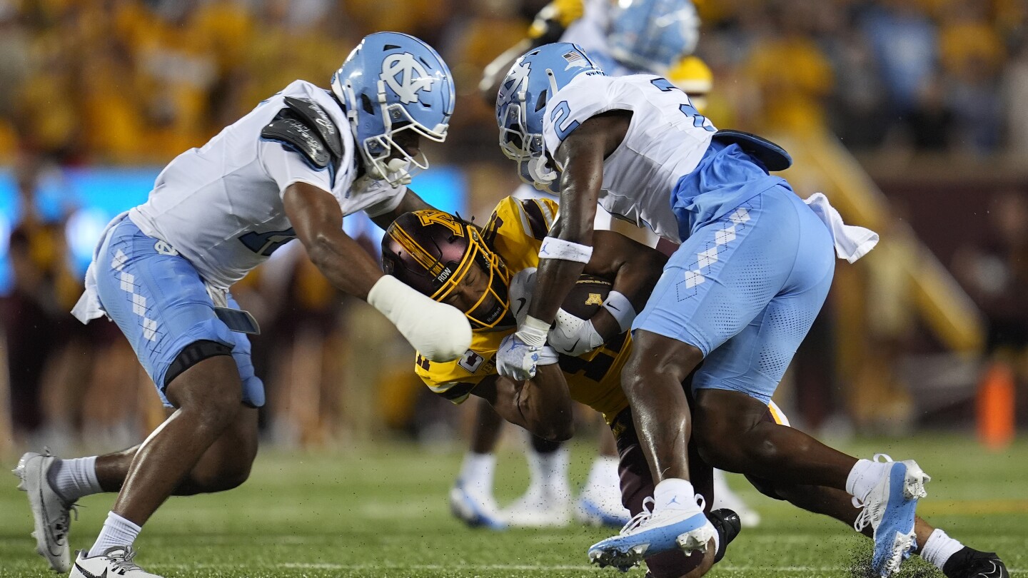 UNC ekes out 19-17 win on Minnesota’s missed FG as time expires; Tar Heels QB Johnson injured