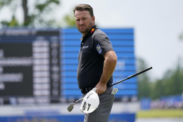 FILE - Graeme McDowell, of Northern Ireland, reacts after missing a putt on the 18th green during the second round of the PGA Zurich Classic golf tournament, Friday, April 22, 2022, at TPC Louisiana in Avondale, La.  McDowell says he accepts it is “incredibly polarizing” to join the Saudi-funded rebel golf tour. He even offered a reason why, citing the 2018 murder of journalist Jamal Khashoggi in the Saudi consulate in Istanbul. (AP Photo/Gerald Herbert, File)