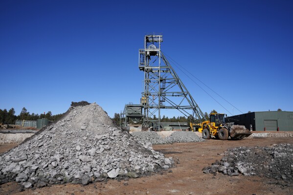 FILE - , ore pile is the first to be mined at the Energy Fuels Inc. uranium Pinyon Plain Mine Wednesday, Jan. 31, 2024, near Tusayan, Ariz. Navajo President Buu Nygren vowed to carry out a plan to enact roadblocks to prevent the transportation of uranium ore through the reservation while the tribe develops regulations to cover what are the first major shipments of uranium through its land in years. (AP Photo/Ross D. Franklin, File)