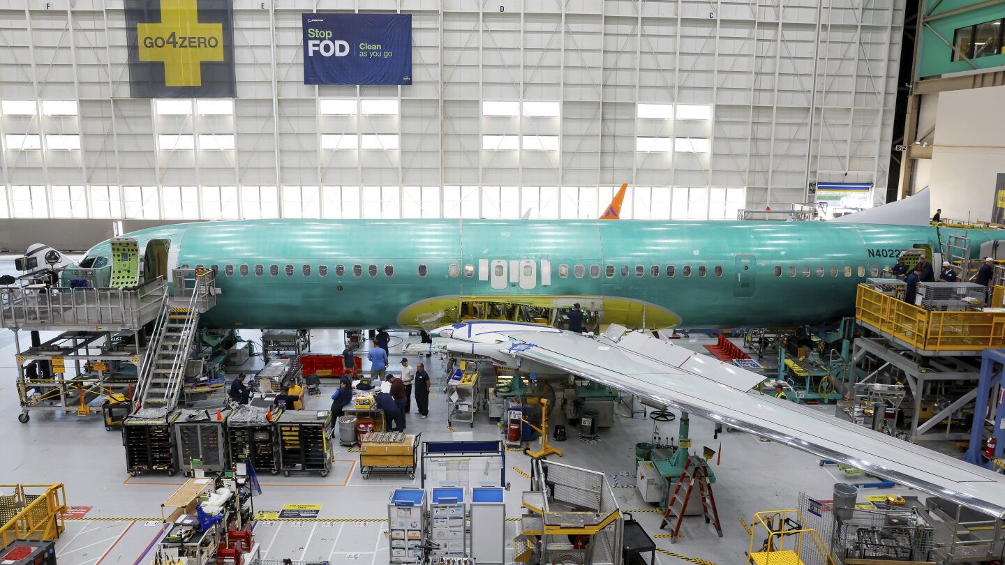 A Boeing 737 MAX aircraft is shown on the assembly line during a brief media tour at the Boeing facility in Renton, Wash., Tuesday, June 25, 2024. (Je