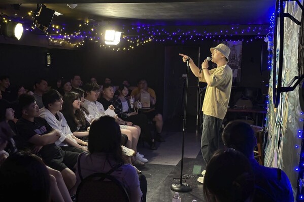 In this photo provided by comedian Lin Dongxiao, who uses the stage name Guazi, Lin performs standup in Toronto, Saturday, June 10, 2023. Lin moved back to China to pursue a career in standup comedy. (Courtesy of Lin Dongxiao via AP)