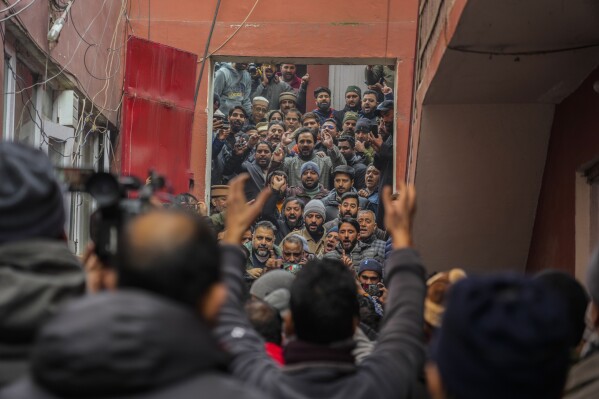 CORRECTS TO SATURDAY INSTEAD OF TUESDAY - Supporters of Jammu Kashmir National Conference shout slogans during a protest in Srinagar, Indian-controlled Kashmir, Saturday, Dec 23, 2023. Anger spread in some remote parts of Indian-controlled Kashmir after three civilians were killed while in army custody, officials and residents said Saturday. This comes two days after a militant ambush killed four soldiers. (AP Photo/Mukhtar Khan)