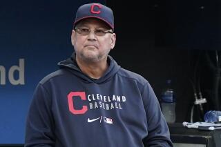 FILE - In this July 9, 2021, file photo, Cleveland Indians manager Terry Francona watches in the fifth inning of a baseball game against the Kansas City Royals in Cleveland. Francona will need several months of rehab to recover from toe surgery, his second operation since stepping aside for the season in July. Francona, who had hip replacement surgery in August, had surgery Tuesday, Sept. 7, 2021, at the Cleveland Clinic. The procedure was to fix his left big toe, which became infected during the offseason. (AP Photo/Tony Dejak, File)