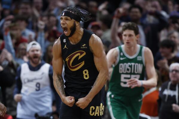 Cleveland Cavaliers forward Lamar Stevens (8) celebrates after scoring against the Boston Celtics during overtime of an NBA basketball game, Monday, March 6, 2023, in Cleveland. (AP Photo/Ron Schwane)