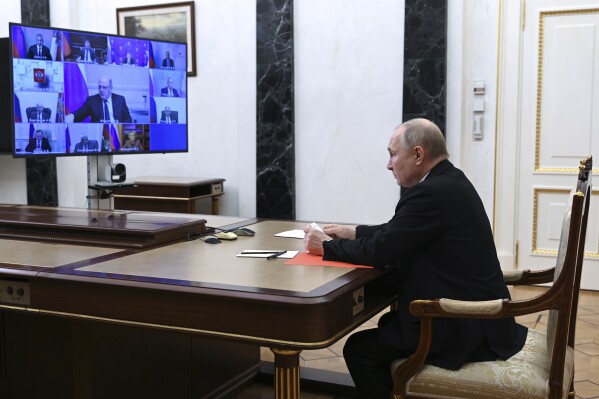 Russian President Vladimir Putin chairs a Security Council meeting via videoconference at the Kremlin in Moscow, Russia, Friday, April 5, 2024. (Pavel Byrkin, Sputnik, Kremlin Pool Photo via AP)