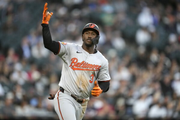 Baltimore Orioles' Jorge Mateo begins to celebrate his three-run home run off Chicago White Sox starting pitcher Mike Clevinger during the fourth inning of a baseball game Thursday, May 23, 2024, in Chicago. (AP Photo/Charles Rex Arbogast)