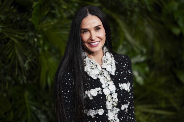 Demi Moore arrives at Chanel's 16th Annual Pre-Oscar Awards Dinner on Saturday, March 1, 2025, at The Beverly Hills Hotel in Beverly Hills, Calif. (Photo by Jordan Strauss/Invision/AP)