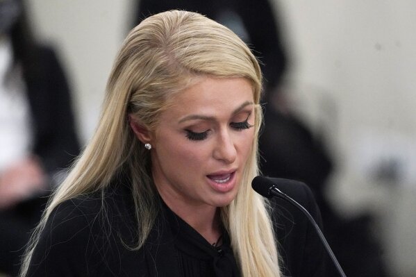 Paris Hilton speaks at a committee hearing at the Utah State Capitol, Monday, Feb. 8, 2021, in Salt Lake City. Hilton has been speaking out about abuse she says she suffered at a boarding school in Utah in the 1990s and she testified in front of state lawmakers weighing new regulations for the industry. (AP Photo/Rick Bowmer)