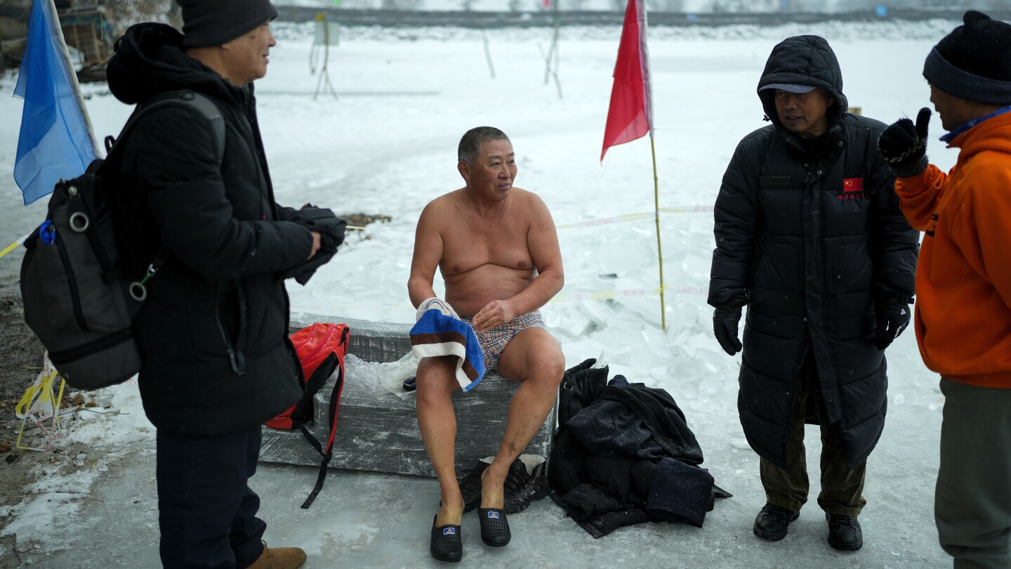 Brave Swimmers Take the Plunge: Ice Swimming in China for Health and Happiness