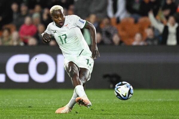 FILE -Zambia's Racheal Kundananji scores her team's third goal during the Women's World Cup Group C soccer match between Costa Rica and Zambia in Hamilton, New Zealand, Monday, July 31, 2023. National Women's Soccer League expansion team Bay FC have acquired forward Racheal Kundananji of Zambia to a four-year deal with an option for a fifth year.(AP Photo/Andrew Cornaga, File)