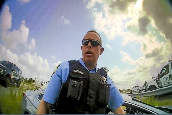This still image from a deputy’s body camera video provided by the Camden County Sheriff's Office shows Staff Sgt. Buck Aldridge following a chase and arrest on June 24, 2022. Aldridge was placed on administrative pending an investigation after he fatally shot Leonard Cure on Oct. 16, 2023, in Camden County, Georgia. The deputy shot the Black man at point-blank range during a traffic stop after the man, who had been wrongfully imprisoned years ago, grabbed the officer by the neck and was forcing his head backward, according to video released by a sheriff. (Camden County Sheriff's Office via AP)