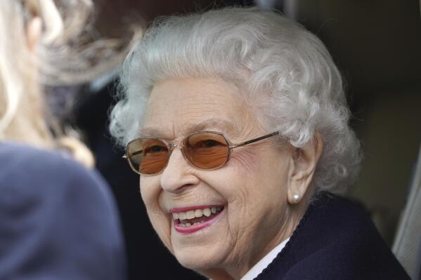 Britain's Queen Elizabeth II smiles as she attends at the Royal Windsor Horse Show, Windsor, England, Friday May 13, 2022. The Queen's appearance at the Royal Windsor Horse Show came a few days after she delegated the opening of Parliament to Prince Charles. (Steve Parsons/PA via AP)