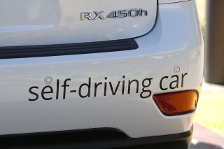FILE - Google's self-driving Lexus car drives along street during a demonstration at Google campus on May 13, 2015, in Mountain View, Calif. Advocates for the self-driving vehicle industry on Wednesday, July 26, 2023, warned that years of regulatory inaction is putting American manufacturers at a competitive disadvantage and urged Congress to expand their ability to test and eventually sell autonomous cars and trucks. (AP Photo/Tony Avelar, File)