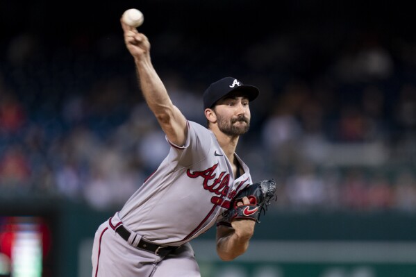 Atlanta Braves starting pitcher Spencer Strider delivers during the second inning of the second game of a baseball doubleheader against the Washington Nationals, Sunday, Sept. 24, 2023, in Washington. (AP Photo/Stephanie Scarbrough)