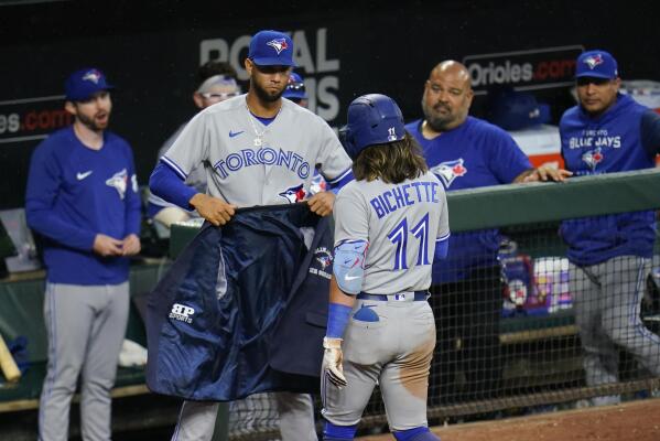 Bo Bichette of the Toronto Blue Jays runs to the dugout after