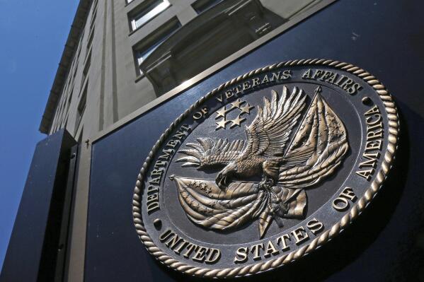 FILE - This June 21, 2013, file photo, shows the seal affixed to the front of the Department of Veterans Affairs building in Washington. The federal government wrote duplicate checks to doctors who provided care for veterans, costing taxpayers $128 million in extra payments over the last five years, according to a new watchdog report out this week. In nearly 300,000 cases, private doctors were paid twice – once by the Veterans Health Administration and another time by Medicare – for the same care provided to veterans from 2017 to 2021, the Health and Human Services Office of Inspector General found in its report. (AP Photo/Charles Dharapak, File)