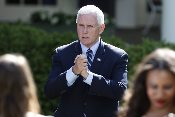 Vice President Mike Pence speaks to attendees after a White House National Day of Prayer Service in the Rose Garden of the White House, Thursday, May 7, 2020, in Washington. (AP Photo/Alex Brandon)