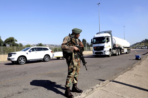 South African Defence Force (SANDF) patrol at a toll station in Durban, South Africa, Friday July 14, 2023. South Africa deployed the army in four of its provinces after at least 21 trucks carrying goods were set on fire in various parts of the country in the span of five days. The move came amid concerns of more violent unrest over a court decision that could send former president Jacob Zuma back to jail, although authorities denied the two issues are connected. (AP Photo)