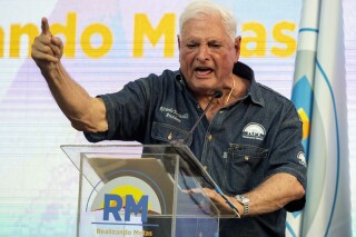 Panama's former President Ricardo Martinelli speaks to supporters during a campaign rally, in Panama City, Saturday, Feb. 3, 2024. Panama's Supreme Court, on Friday, denied an appeal from Martinelli, convicted of money laundering in the case of a media company he purchased, likely ending his re-election bid. (AP Photo/Agustin Herrera)