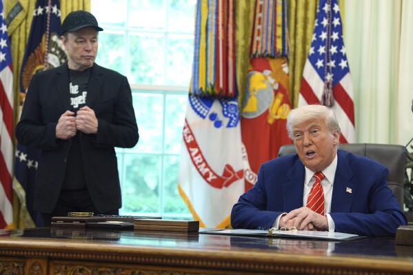 President Donald Trump speaks during a news conference with Elon Musk in the Oval Office of the White House, Friday, May 30, 2025, in Washington. (AP Photo/Evan Vucci)