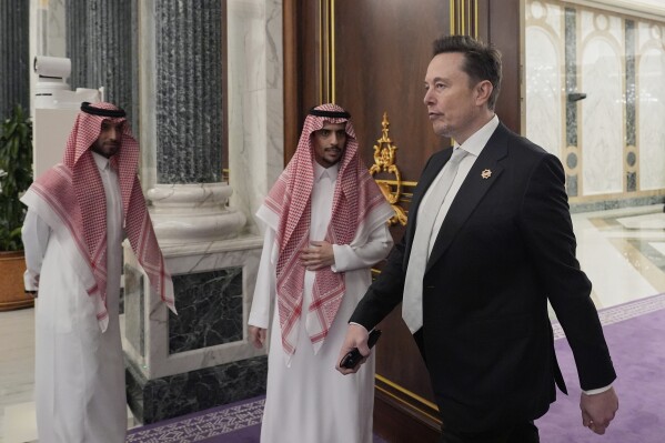 Elon Musk, departs a lunch between President Donald Trump and Saudi Crown Prince Mohammed bin Salman at the Royal Palace in Riyadh, Saudi Arabia, Tuesday, May 13, 2025. (AP Photo/Alex Brandon)