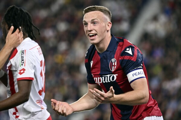 Bologna's Lewis Ferguson reacts during a Serie A soccer match against Monza at Renato Dall'Ara Stadium in Bologna, Italy, Saturday April 13, 2024. (Massimo Paolone/LaPresse via AP)