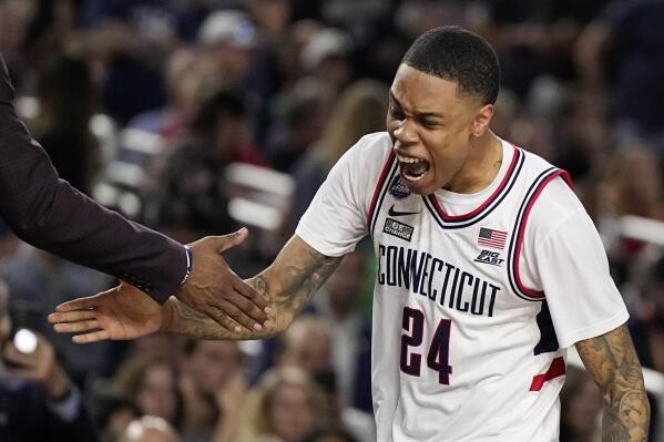 Connecticut guard Jordan Hawkins celebrates during the second half of the men's national championship college basketball game against San Diego State in the NCAA Tournament on Monday, April 3, 2023, in Houston. (AP Photo/Brynn Anderson)