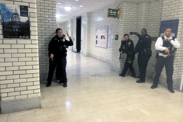 Police officers are seen during a lockdown of the Maryland State House in Annapolis, Md. on Thursday, Feb. 29, 2024. The building was locked down for an undisclosed security threat. (AP Photo/Brian Witte.)
