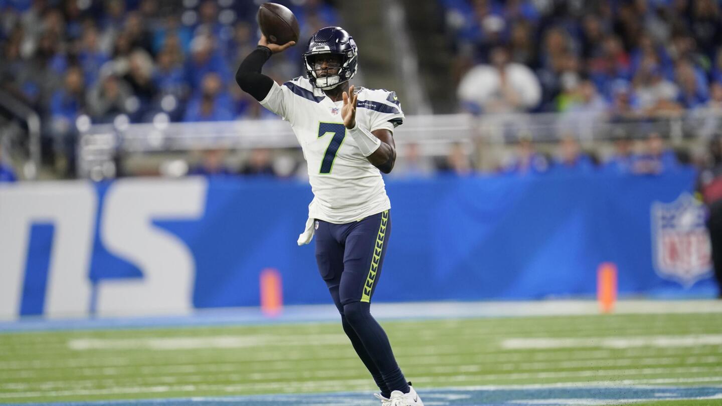 DK Metcalf of the Seattle Seahawks reacts after diving to make a