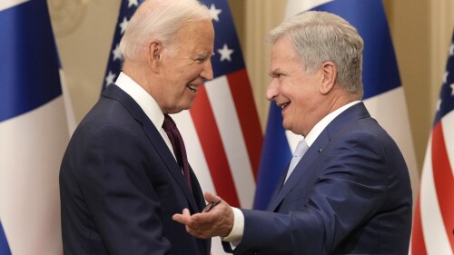 Finland's President Sauli Niinisto, right, and U.S. President Joe Biden smile after their press conference in Helsinki, Finland, Thursday, July 13, 2023. Biden is in Finland to attend the US–Nordic Leaders' Summit. (AP Photo/Sergei Grits)