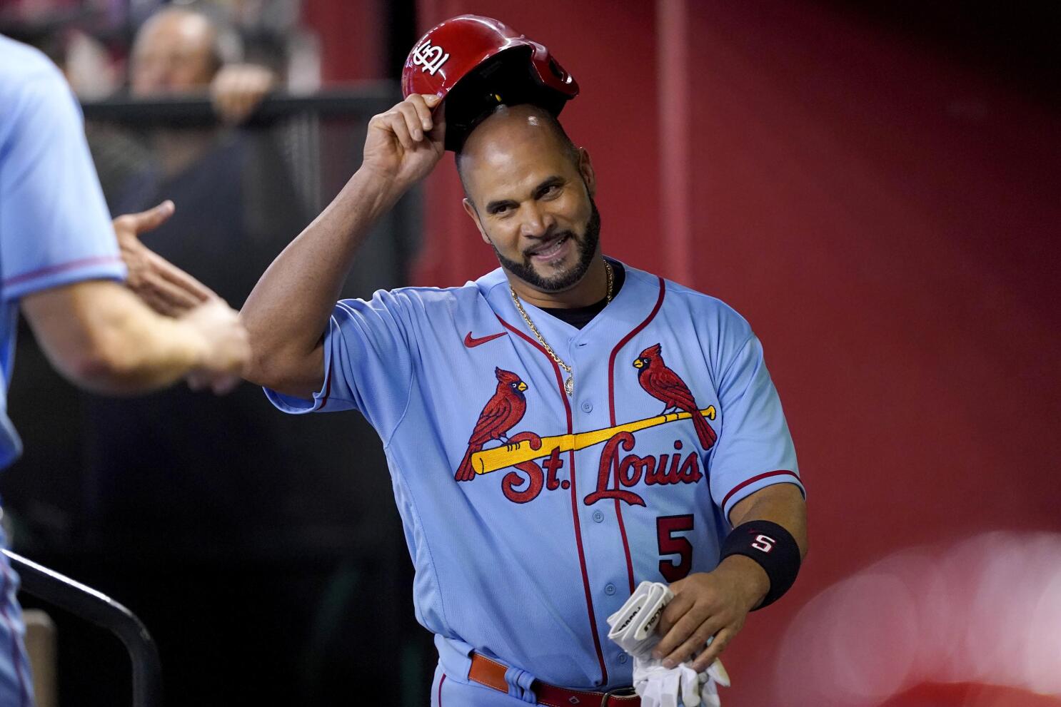 Cardinals split doubleheader with Nationals behind offense-heavy
