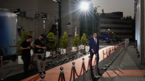 Prime Minister and Socialist candidate Pedro Sanchez arrives at a live televised debate ahead of the Spanish general election in Madrid, Spain, Wednesday, July 19, 2023. Sunday's Spanish election will be a battle between two left-wing and two right-wing parties coming together to form possible coalitions.  Pedro Sánchez, Spanish Prime Minister since 2018, faces re-election with the latest votes and most polls against him.  (AP Photo/Bernat Armangue)