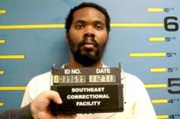 FILE - In this file photo provided by the Missouri Department of Corrections is Cornealious Anderson who was convicted of armed robbery in 2000, sentenced to 13 years in jail and told to await instruction on when to report to prison. Those instructions never came and he went on about his life until the clerical error was caught in 2013. Anderson, now jailed, filed a petition in Mississippi County Circuit Court on Tuesday, April 22, 2014 seeking to require the Missouri Department of Corrections to credit the 13 years he was technically at large after a 2000 robbery conviction. (AP Photo/Missouri Department of Corrections, File)