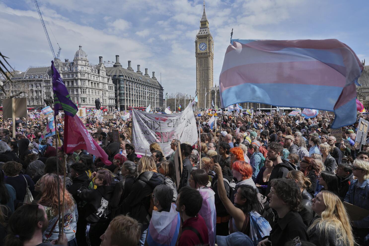 Thousands gather in London to support trans rights after court ruling on definition of woman