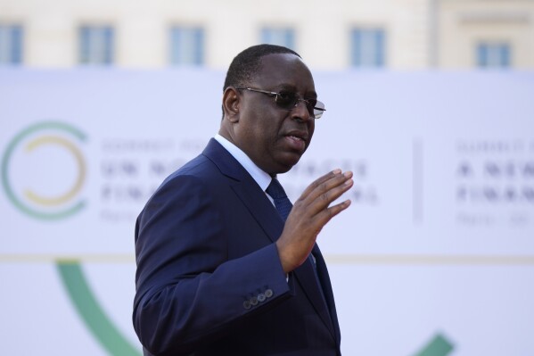 FILE - Senegal's President Macky Sall arrives for the closing session of the New Global Financial Pact Summit, Friday, June 23, 2023 in Paris. Senegalese President Sall declared Monday evening, July 3, that he will not run for a third term in next year's elections, ending years of uncertainty over his political future that had helped fuel deadly opposition protests last month. (AP Photo/Lewis Joly, Pool, File)