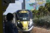 A Brightline train approaches the Fort Lauderdale station on Friday, Sept. 8, 2023, in Fort Lauderdale, Fla. The first big test of whether privately owned high-speed passenger train service can prosper in the United States will launch Friday, Sept. 22, when Florida's Brightline begins running trains between Miami and Orlando, reaching speeds of 125 mph (200 kph). (AP Photo/Marta Lavandier)