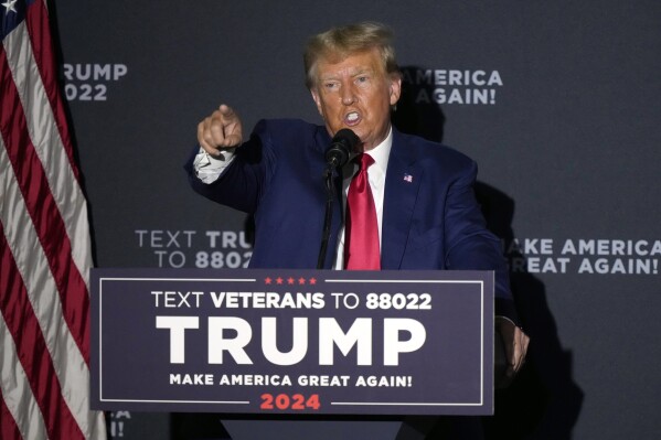 Republican presidential candidate former President Donald Trump speaks at a campaign rally, Tuesday Aug. 8, 2023, at Windham High School in Windham, N.H. (AP Photo/Robert F. Bukaty)