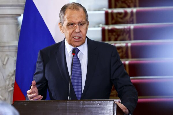 In this photo released by Russian Foreign Ministry Press Service, Russia's Foreign Minister Sergey Lavrov gestures during his and Egyptian Foreign Minister Sameh Shukry joint news conference following their talks in Cairo, Egypt, Monday, April 12, 2021. (Russian Foreign Ministry Press Service via AP)