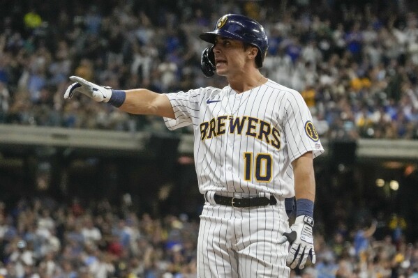 Milwaukee Brewers' Sal Frelick reacts after hitting an RBI single during the sixth inning of a baseball game against the Atlanta Braves Saturday, July 22, 2023, in Milwaukee. (AP Photo/Morry Gash)