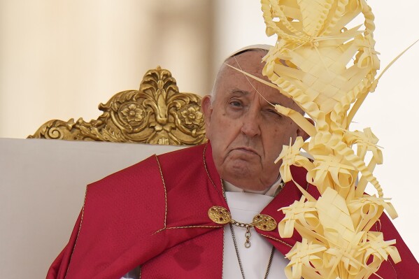 Pope Francis celebrates the Palm Sunday mass in St. Peter's Square at the Vatican, Sunday, March 24, 2024. (AP Photo/Alessandra Tarantino)