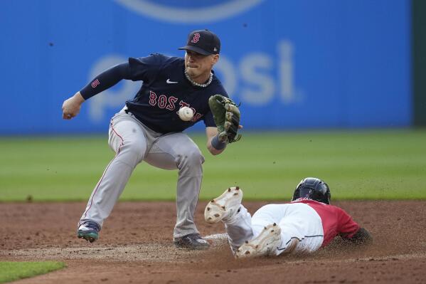 Boston Red Sox's Enrique Hernandez dunks away from a low pitch in the  fourth inning of the team's baseball game against the Cleveland Guardians,  Wednesday, June 7, 2023, in Cleveland. (AP Photo/Sue