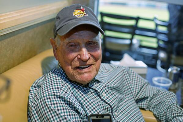 FILE - In this Tuesday, Nov. 1, 2016 file photo, Eddie Robinson sits in a box at Progressive Field before Game 6 of the Major League Baseball World Series against the Chicago Cubs in Cleveland. Former big leaguer and general manager Eddie Robinson, who was the oldest living former MLB player, has died at age 100. The Texas Rangers, the team for which Robinson was GM from 1976-82, said he passed away Monday night, Oct. 4, 2021 at his ranch in Bastrop, Texas.(AP Photo/Gene J. Puskar)