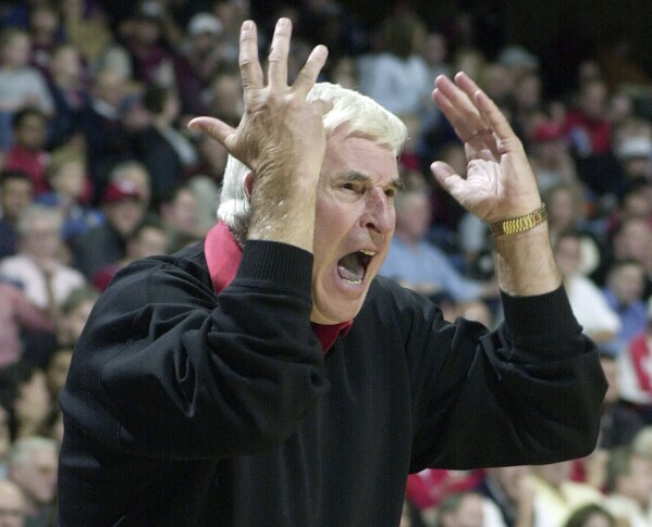 FILE - Texas Tech coach Bob Knight yells from the sideline during the first half of the team's NCAA college basketball game against Houston on Dec. 14, 2001, in Houston. Knight, the brilliant and combustible coach who won three NCAA titles at Indiana and for years was the scowling face of college basketball, has died. He was 83. Knight's family made the announcement on social media on Wednesday night, Nov. 1, 2023, saying he was surrounded by family members at his home in Bloomington, Ind. (AP Photo/Pat Sullivan, File)