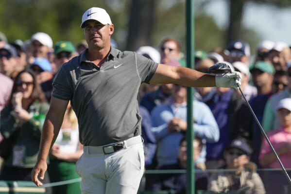 Brooks Koepka watches his tee shot on the eighth hole during the final round of the Masters golf tournament at Augusta National Golf Club on Sunday, April 9, 2023, in Augusta, Ga. (AP Photo/Mark Baker)