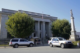 FILE - A Confederate monument stands outside the Alamance County Courthouse in Graham, N.C., Oct. 7, 2020. A state appeals court ruled Tuesday, March 19, 2024, that local leaders who refused calls to the monument acted in a constitutional manner, saying the statue was properly kept in its longstanding location under state law. (AP Photo/Gerry Broome, File)