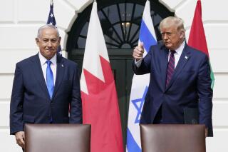 FILE - President Donald Trump and Israeli Prime Minister Benjamin Netanyahu attend the Abraham Accords signing ceremony on the South Lawn of the White House, in Washington, Sept. 15, 2020. Former President Donald Trump lashed out with profanity at Benjamin Netanyahu for congratulating President Joe Biden on his victory in last year's election, an Israeli newspaper reported Friday, Dec. 10, 2021. (AP Photo/Alex Brandon, File)