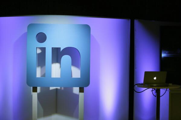 FILE - In this Thursday, Sept. 22, 2016, file photo, the LinkedIn logo is displayed during a product announcement in San Francisco.  Microsoft says it is shutting down its LinkedIn service in China later this year following tighter government censorship rules. The company said in a blog post Thursday, Oct. 14, 2021,  it has faced “a significantly more challenging operating environment and greater compliance requirements in China.”  (AP Photo/Eric Risberg, File)
