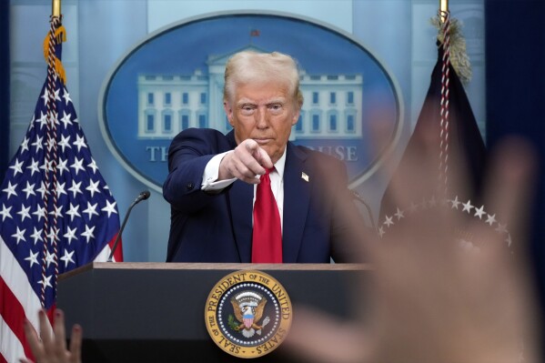 President Donald Trump calls on a reporter to ask a question in the James Brady Press Briefing Room at the White House, Thursday, Jan. 30, 2025, in Washington. (AP Photo/Alex Brandon)