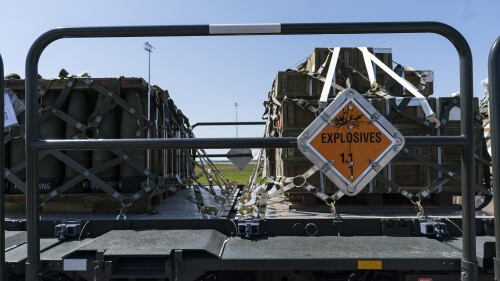 FILE - Pallets of 155 mm shells and fuses are loaded, ultimately bound for Ukraine, April 29, 2022, at Dover Air Force Base, Del. U.S. officials say on July 24, 2023, the Biden administration is sending up to $400 million in additional military aid to Ukraine (AP Photo/Alex Brandon)